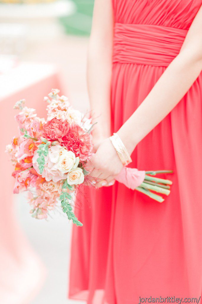 Beautiful coral blush peach bridesmaid bouquet